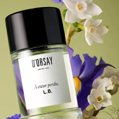 D'Orsay perfume bottle with flowers in the background