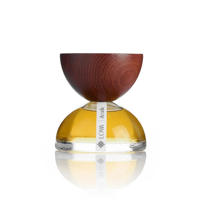 Perfume bottle with wooden cap on a white background