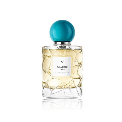 Perfume bottle with a turquoise cap on a white background