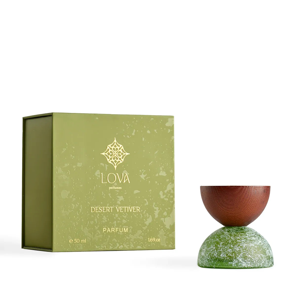 LOVA Desert Vetiver parfum packaging with a green box and wooden and green container on a white background