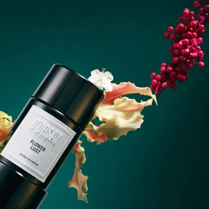 Perfume bottle labeled 'Flower Lust' with floral elements on a dark green background