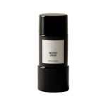 Black perfume bottle labeled 'Incense Crush' on a white background