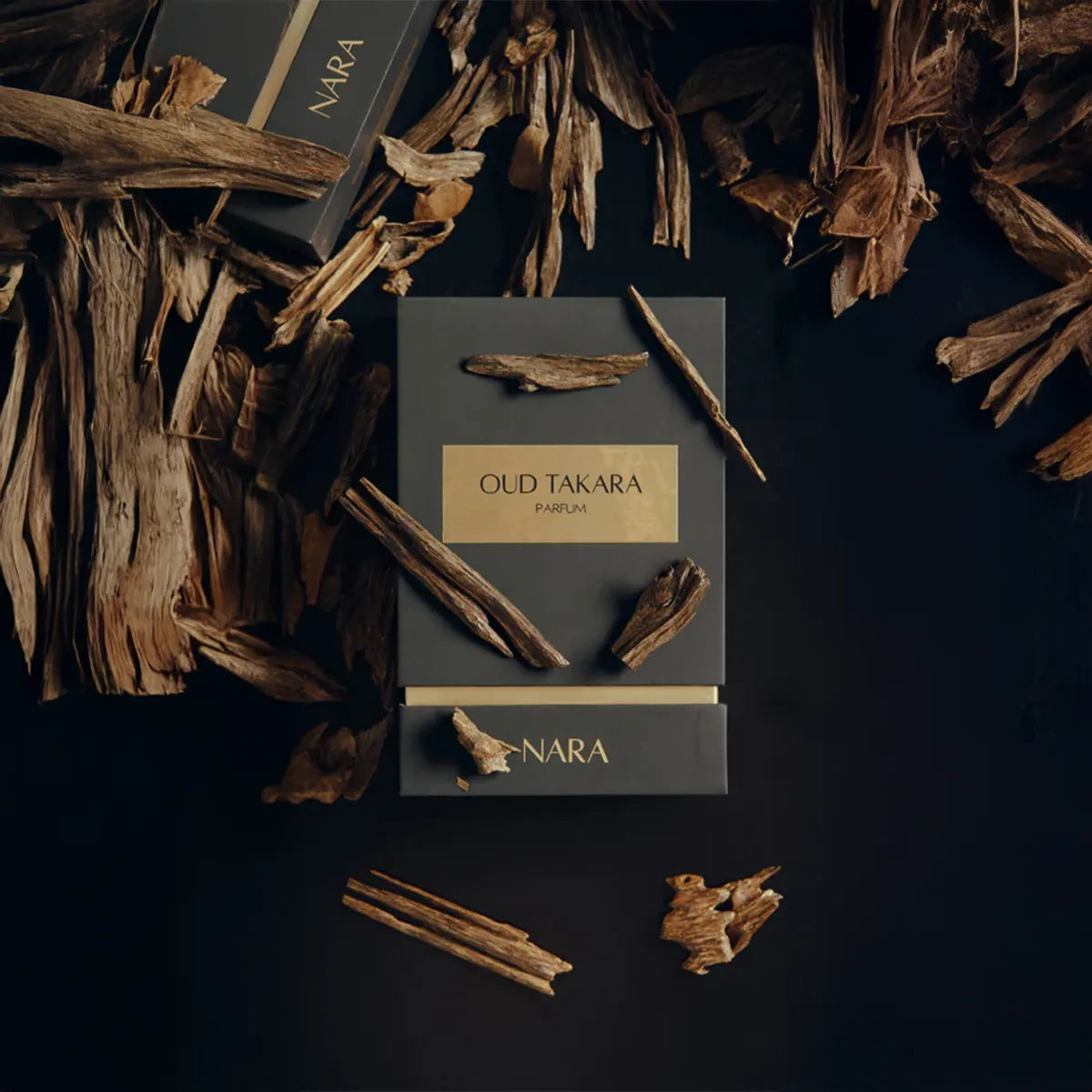 NARA Old Takara perfume packaging with wooden elements on a dark background