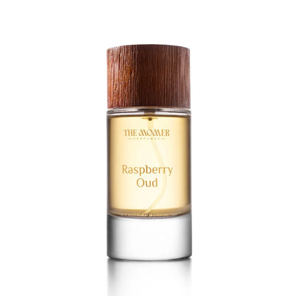 Perfume bottle labeled 'Raspberry Oud' with a wooden cap on a white background