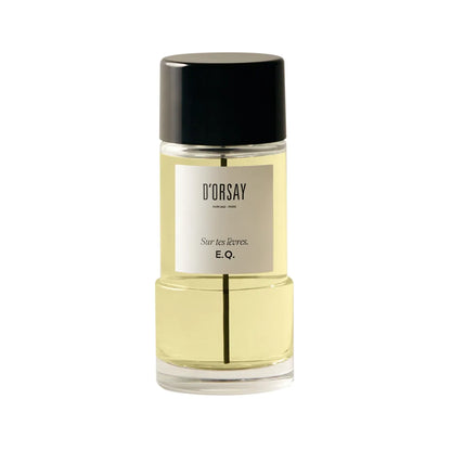 Perfume bottle with black cap and visible label on a white background