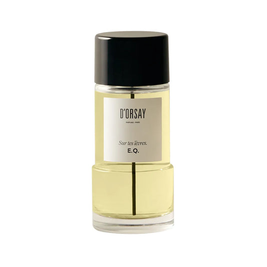 Perfume bottle with black cap and visible label on a white background